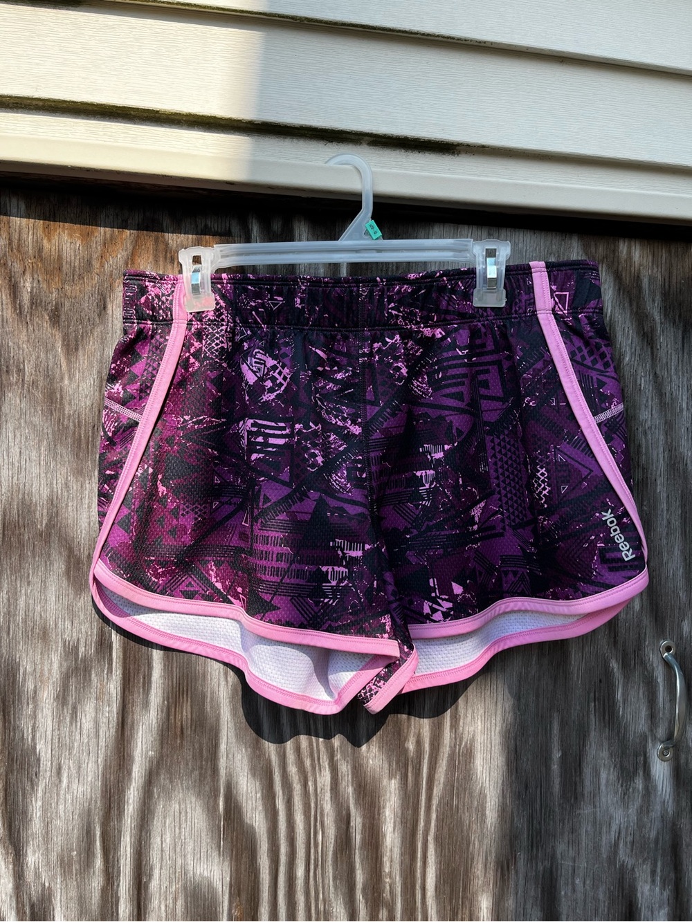 Reebok women’s large athletic shorts pink and purple